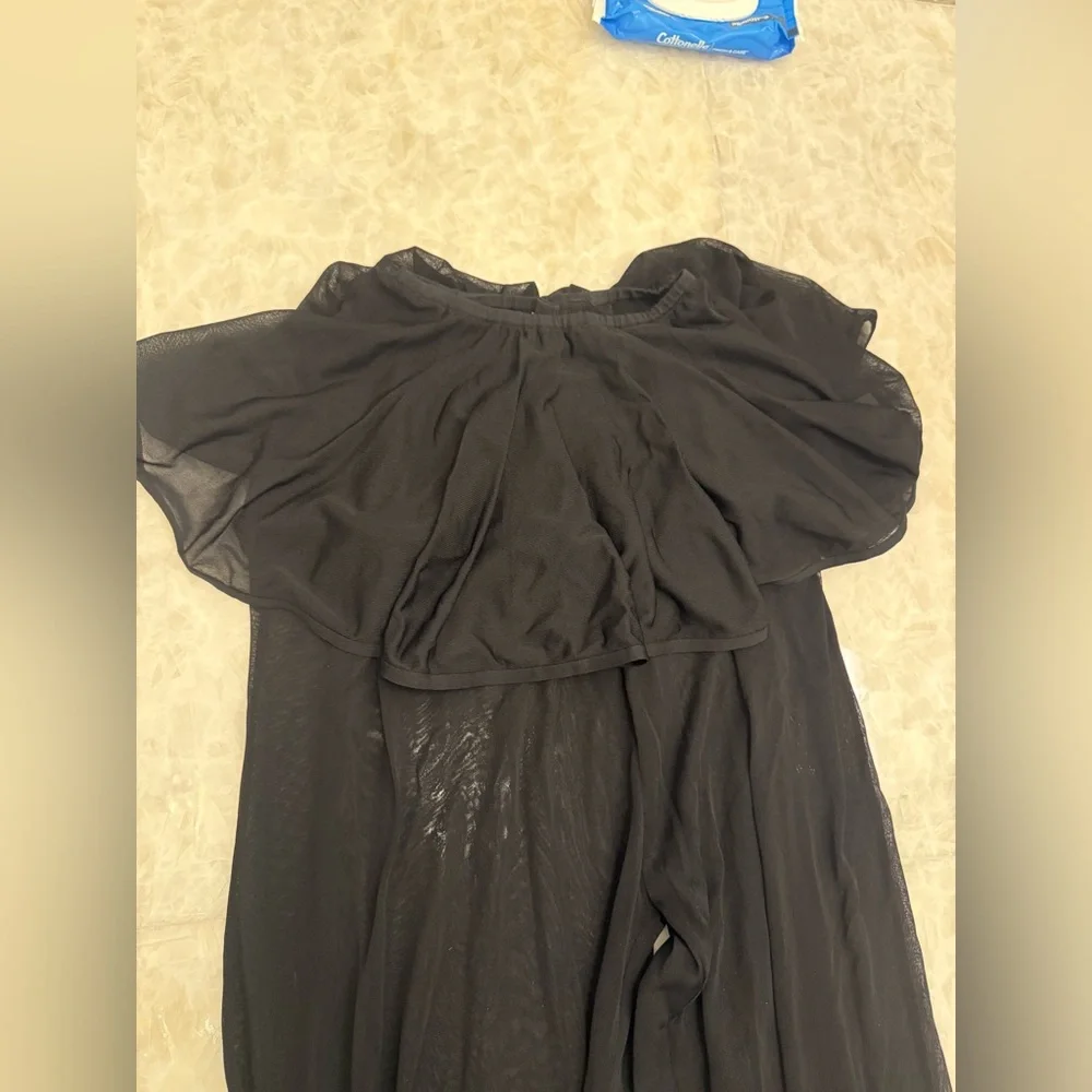 $3375 Alaia sheer peplum black balloon pants